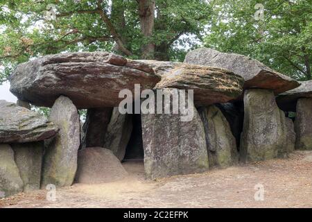 Dolmen La Roche-aux-Fees or The Fairies' Rock is a Neolithic passage grave - dolmen - located in the commune of Esse, in the French department of Ille Stock Photo