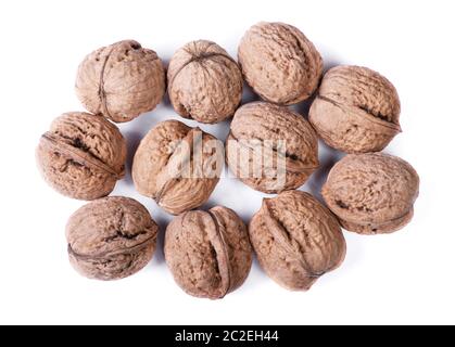 Group of big whole walnuts isolated on white background Stock Photo