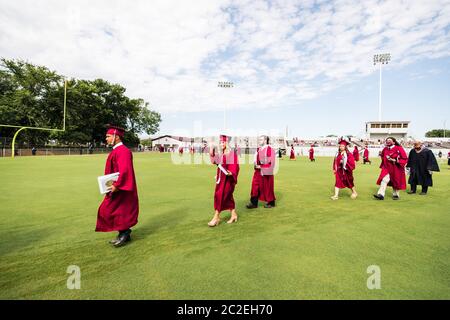 The Sherman High School Class of 2020 commencement ceremony is held on June 13 at Bearcat Stadium in Sherman, TX. Stock Photo