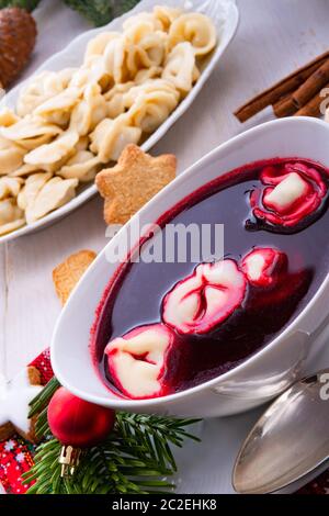 Barszcz (beetroot soup) with small pierogi Stock Photo