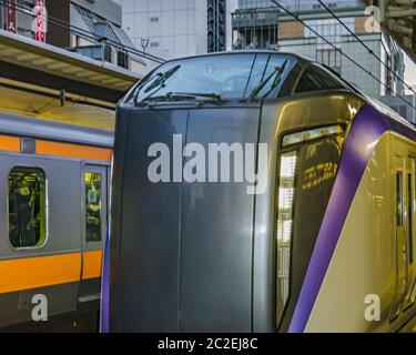 Train Arriving to Station, Tokyo, Japan Stock Photo