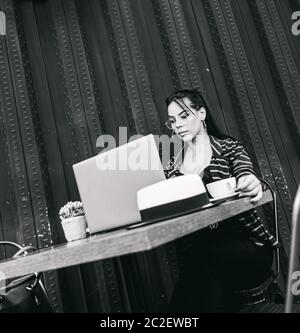 woman working on a bar terrace, entrepreneur Stock Photo