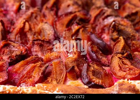 bavarian plum pie on dark wood Stock Photo