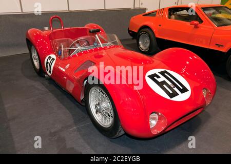 Three-quarters front view of a Red, 1959, Maserati Tipo 60/61 Birdcage', on display in the paddock area of the 2019 London Classic Car Show Stock Photo