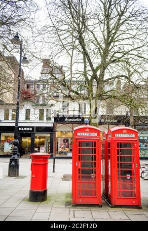 Telephone boxes on The Promenade in Cheltenham, UK Stock Photo