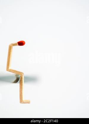 matchstick as a symbol of burnout, bullying, depression, dejection, problems and worries Stock Photo
