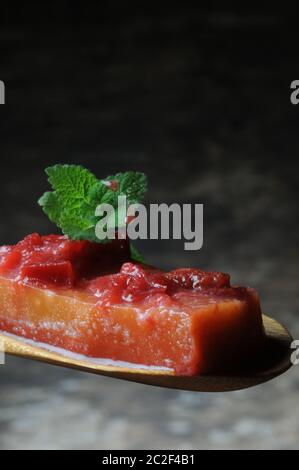 Slice of aspic with peaches Stock Photo