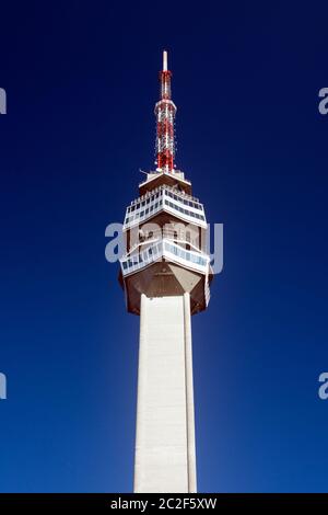 Avala tower in Belgrade city in Serbia is a touristic destination, dark blue sky background. Stock Photo