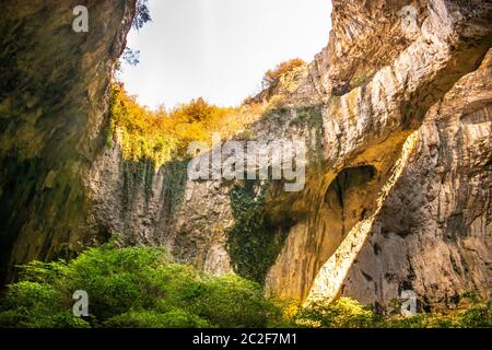 View inside the Devetashka Cave near Devetaki village and Osam river in Lovech, Bulgaria. Natural wonder. One of the largest karst cave in Eastern Europe, now home to near 30000 bats Stock Photo