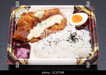 Japanese chicken nanban bento lunch on black background Stock Photo