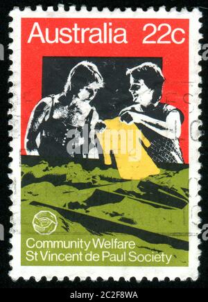 AUSTRALIA - CIRCA 1980: stamp printed by Australia, shows Two women, circa 1980 Stock Photo