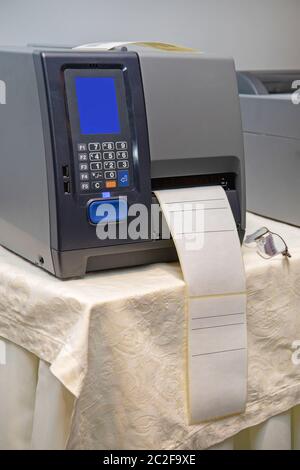 Barcode Label Printer Equipment for Distribution Warehouse Stock Photo