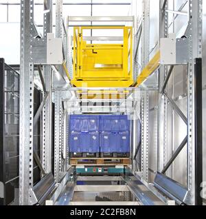 Automated Pallet Shuttle Storage and Retrieval System in Distribution Warehouse Stock Photo