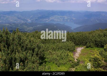 The Ceahlau Massif is one of the most beautiful mountains in Romania. You would find it a very good hiking destination as there are marked trails buil Stock Photo