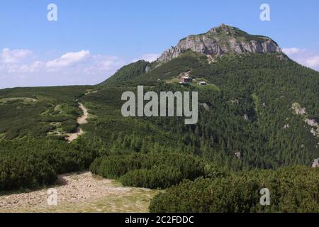 The Ceahlau Massif is one of the most beautiful mountains in Romania. You would find it a very good hiking destination as there are marked trails buil Stock Photo