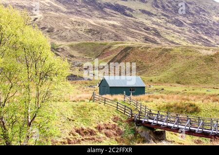 View down Glen Roy with two old buildings in the distant the Scottish highland Stock Photo