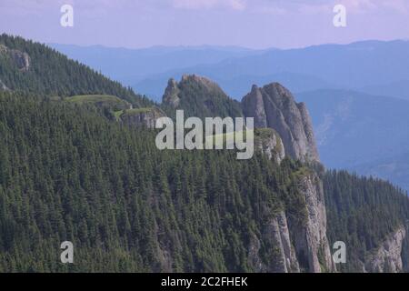 The Ceahlau Massif is one of the most beautiful mountains in Romania. You would find it a very good hiking destination as there are marked trails buil Stock Photo