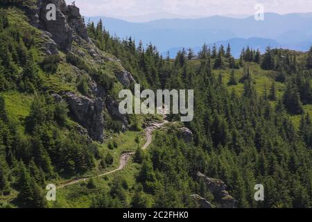 The Ceahlau Massif is one of the most beautiful mountains in Romania. You would find it a very good hiking destination as there are marked trails buil Stock Photo