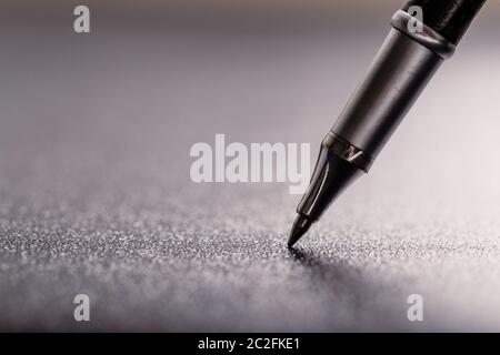 automatic plastic ballpoint pen with clipping path on black background. close up. Stock Photo