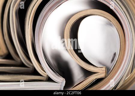 selective focus of the stacking magazine place on white background. Colorful abstract background Stock Photo