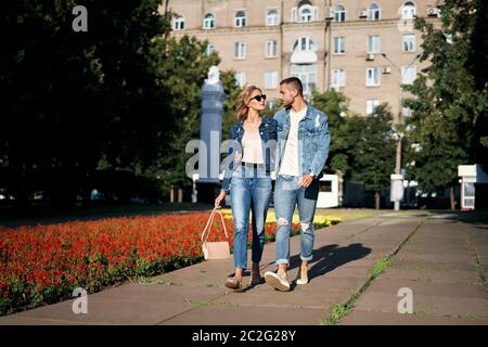 Young couple in love walking outdoors Stock Photo