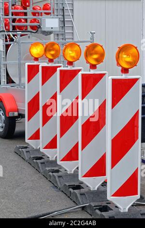 Roadworks Barrier With Amber Beacon Safety Lights Stock Photo