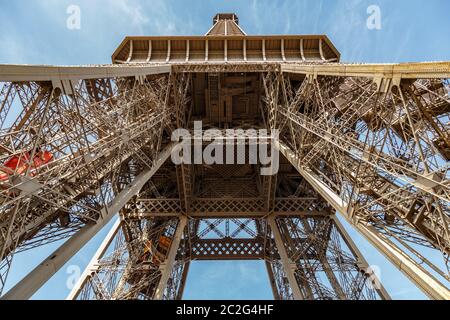 Paris, France, March 30, 2017: Inside the Eiffel Tower in Paris, France. View to the inside of Eiffel Tower. Big symetrical buil Stock Photo