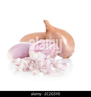 Whole and chopped shallots isolated on a white background with shadow Stock Photo