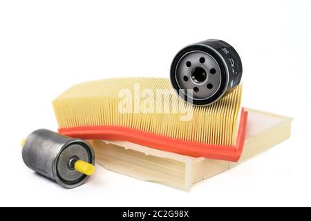 Spare parts for car. Oil filter, air filter, fuel filter and cabin filter on a white background. Stock Photo