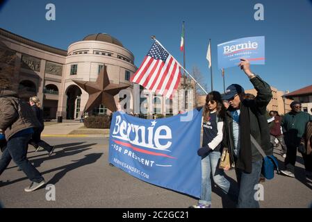 Austin Texas USA, January 18 2016: Supporters of Bernie Sanders, a candidate for the Democratic presidential nomination, walk past the Texas State History Museum as thousands march from the University of Texas to the State Capitol during a march celebrating the Martin Luther King Jr. holiday.  ©Bob Daemmrich Stock Photo
