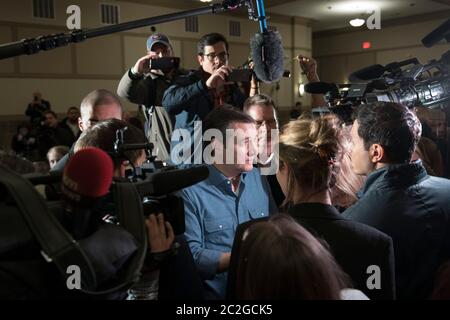 West Des Moines, Iowa USA, January 27 2016: Sen. Ted Cruz of Texas, a candidate for the Republican presidential nomination, talks to supporters as the media listens in on the eve of the final Republican debate before next week's Iowa presidential preference caucuses.   ©Bob Daemmrich Stock Photo