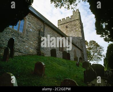 View SW of St Caron's Church, Tregaron, Ceredigion, Wales, UK, built on a steep-sided mound rising above the Afon Groes which flows into the R. Teifi. Stock Photo