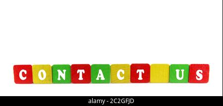 Studio Shot Of Colorful Toy Blocks Against White Background Stock Photo