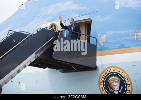 Austin Texas USA, March 11 2016: President Barack Obama disembarks from Air Force One upon arrival at the Austin airport before he speaks about the digital divide during a keynote speech at South by Southwest digital conference.   ©Bob Daemmrich Stock Photo