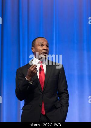 Houston Texas USA, April 14, 2016: Legendary boxer Sugar Ray Leonard, who won world titles in five different weight divisions, delivers a motivational and inspirational message at a business convention.  ©Bob Daemmrich Stock Photo