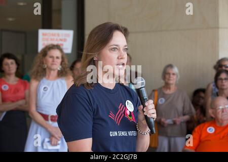 Austin Texas USA, June 29, 2016: Woman speaks at small anti-gun violence rally outside AFL-CIO headquarters featuring victims of gun violence. ©Bob Daemmrich Stock Photo