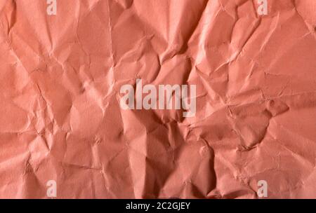 Red crumpled Wrinkled Paper Texture for background Stock Photo