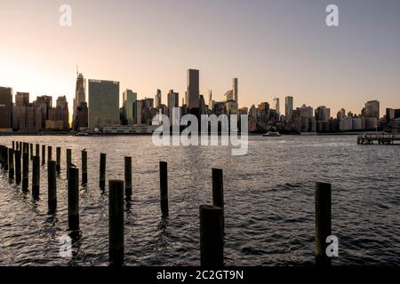Long Island City Gantry sign and Manhattan midtwon skyline in front of east river Stock Photo