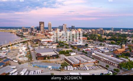 Colorful bridges lead into the buildings and streets of downtown city center Louisville Kentucky Stock Photo