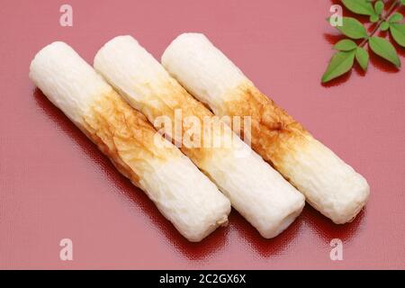 Japanese food, Chikuwa kamaboko on red background Stock Photo