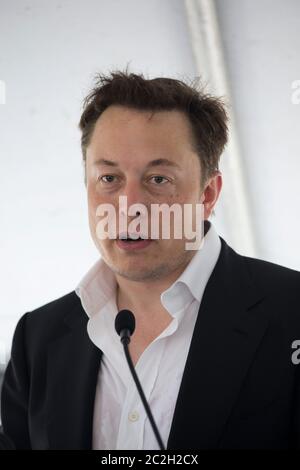 Boca Chica Texas USA, September 23 2014: SpaceX CEO Elon Musk speaks during a press conference before breaking ground on the site of the company's new space port in far south Texas.  The remote site east of Brownsville, Texas is two miles from the mouth of the Rio Grande River and Texas' border with Mexico.  ©Bob Daemmrich Stock Photo