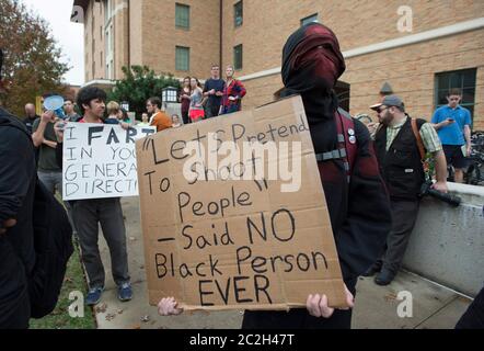 Austin Texas USA, 2015: Groups in favor of and opposed to a proposed law before the Texas legislature that would allow guns anywhere on Texas college campuses hold competing rallies. drawing fewer than 200 people. Pro-gun activists were criticized for holding the event during finals week at Texas.   © Bob Daemmrich Stock Photo