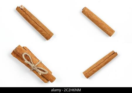 collage. cinnamon sticks on white isolated background. Stock Photo