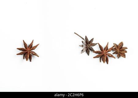 collage. anise stars on white isolated background. Stock Photo