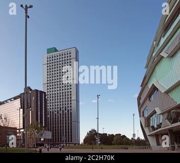 view of the side of the first direct arena in leeds and surrounding hotels and apartments Stock Photo