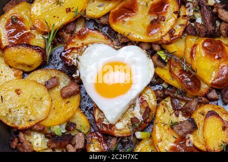 Tiroler gröstl. Potato, bacon and onion hash. Austria Food Stock Photo ...