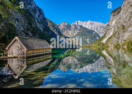 The beautiful Obersee in the Bavarian Alps with a wooden boathouse Stock Photo