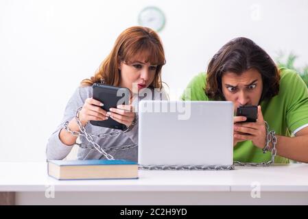 Students in gadget dependency concept Stock Photo