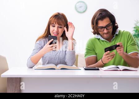 Students in gadget dependency concept Stock Photo