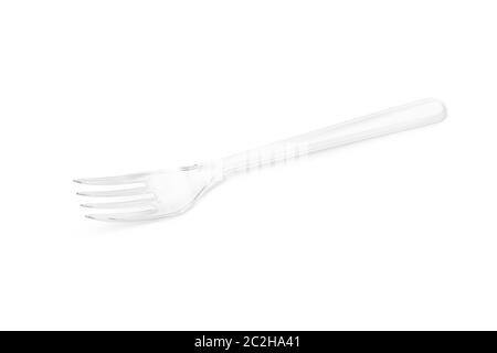 Transparent plastic fork isolated on white background. Close up. With clipping path Stock Photo